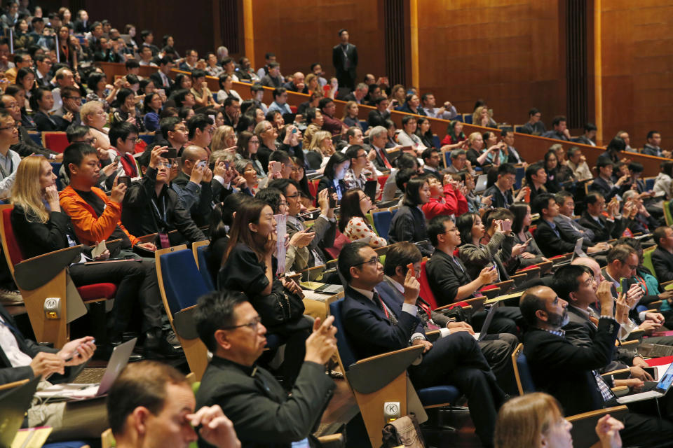 The audience reacts as He Jiankui, a Chinese researcher, speaks during the Human Genome Editing Conference in Hong Kong, Wednesday, Nov. 28, 2018. A Chinese researcher claims that he helped make the world's first genetically edited babies — twin girls whose DNA he said he altered with a powerful new tool capable of rewriting the very blueprint of life. (AP Photo/Kin Cheung)