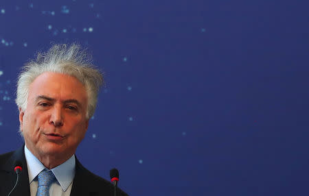 Brazil's President Michel Temer speaks as he participates in the inauguration ceremony of the submarine "Riachuelo", built by the submarine development program (PROSUB), in Itaguai, Brazil December 14, 2018. REUTERS/Pilar Olivares