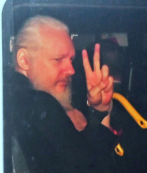 <em>Assange was further arrested over an alleged US government hack (PA)</em>