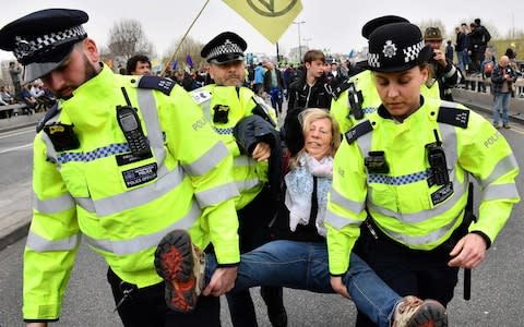 Police officers imposed an order allowing activists to protest only within Marble Arch - Credit: DANIEL LEAL-OLIVAS/AFP