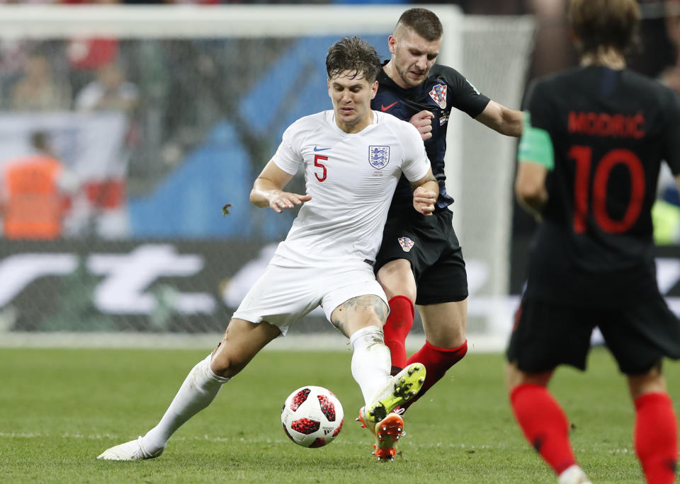 So close: John Stones challenges for the ball with Croatia’s Ante Rebic