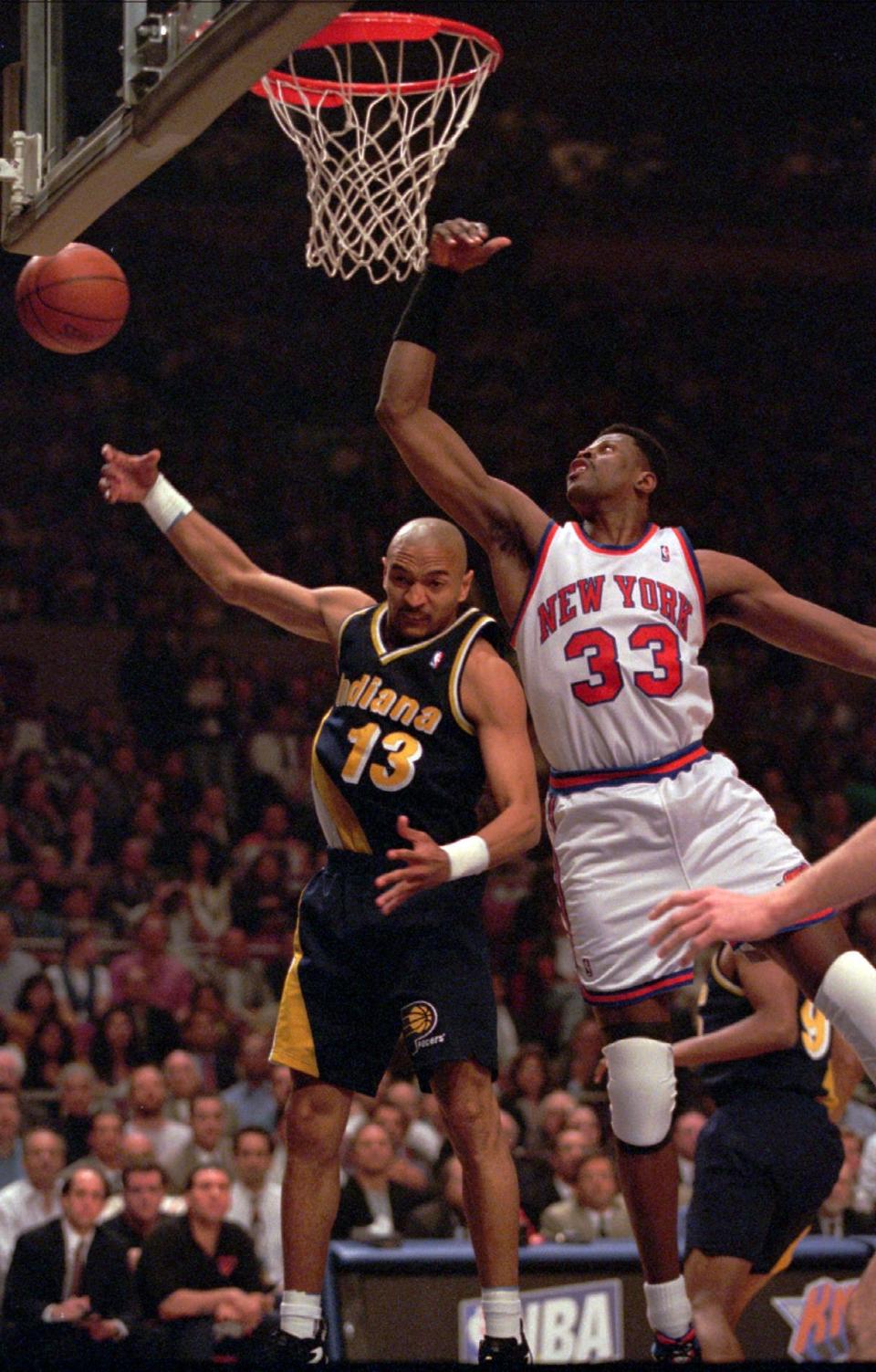 New York Knicks Patrick Ewing and Indiana Pacers Mark Jackson vie for the rebound during the 1995 Eastern Conference semifinals at Madison Square Garden.