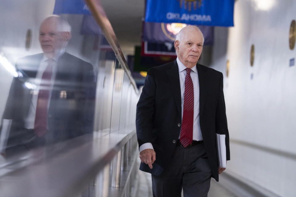 UNITED STATES - APRIL 9: Sen. Ben Cardin, D-Md., speaks to a reporter in the Senate subway after he and Sen. Chris Van Hollen, D-Md., opposed more funds be added to the coronavirus response fund saying it wouldnt 