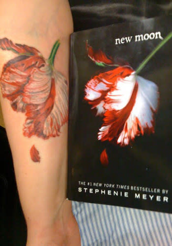 <p>This Twilight fan got the image of the tulip, featured on the cover of the 'New Moon' novel, permanately etched on their arm.<br><br><a rel="nofollow" href="http://au.launch.yahoo.com/galleries/g/-/11512269/inappropriate-on-stage-attire/11512282/" data-ylk="slk:PICS: Inappropriate On-Stage Outfits;elm:context_link;itc:0;sec:content-canvas" class="link ">PICS: Inappropriate On-Stage Outfits</a></p>