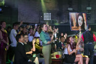 Supporters of Cheryl Yao cheer during the finals of the 2019 Miss Universe Singapore beauty pageant at Zouk.