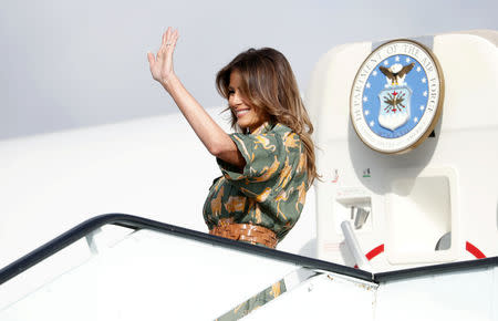 U.S. first lady Melania Trump waves as she departs Nairobi, Kenya, October 6, 2018. REUTERS/Carlo Allegri