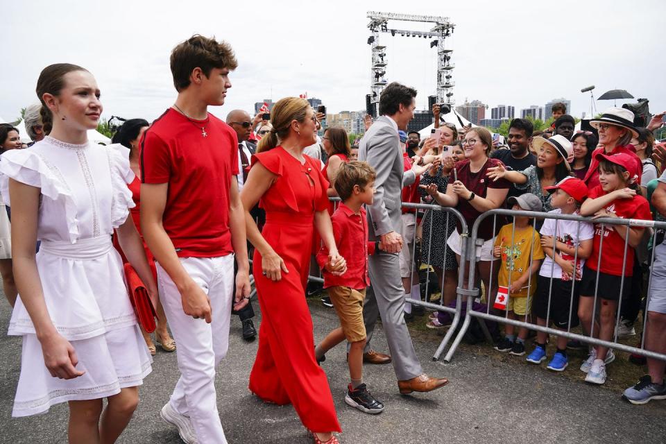Prime Minister Justin Trudeau and wife Sophie Grégoire Trudeau are joined by their children Ella-Grace, Xavier and Hadrien, as they arrive to 2022 Canada Day celebrations in Ottawa. THE CANADIAN PRESS/Sean Kilpatrick