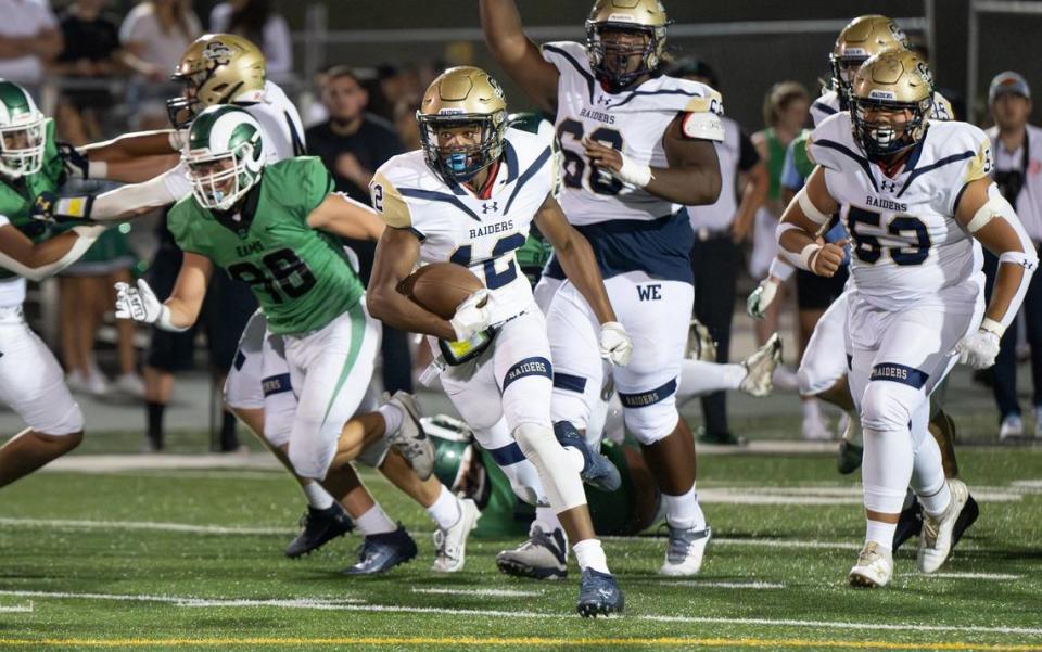 Central Catholic’s Joey Alcutt breaks free on a touchdown run during the game with St. Mary’s in Stockton, Calif., Friday, August 25, 2023.