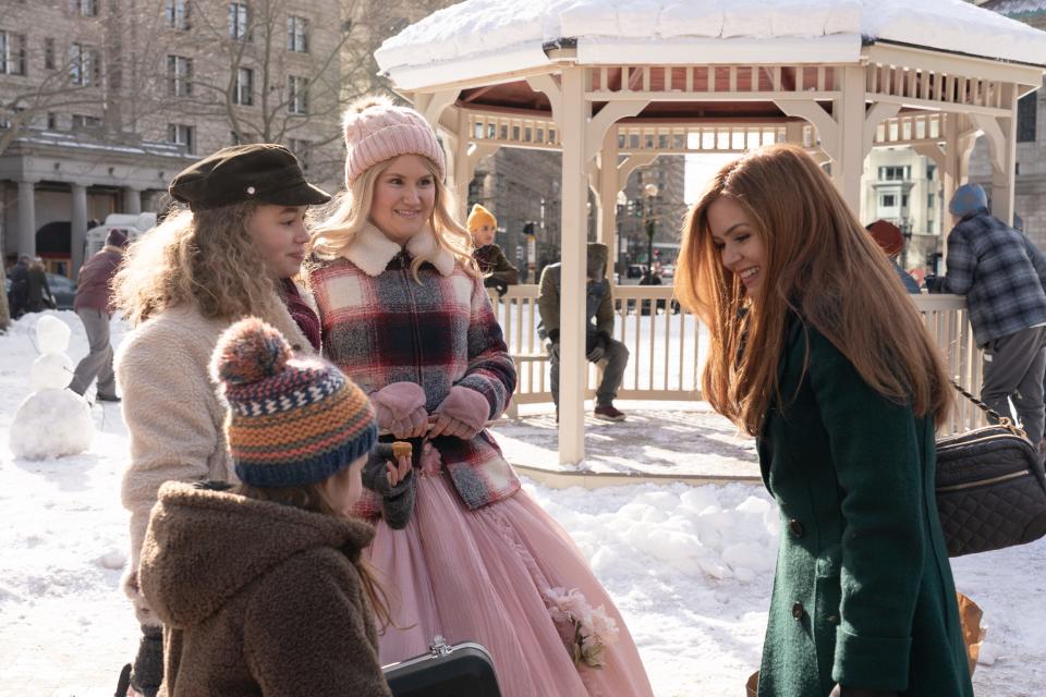 Jillian Bell (center) is a fairy godmother who helps out a Boston mom (Isla Fisher) and her kids (Willa Skye and Jillian Shea Spaeder) in Disney+'s "Godmothered."