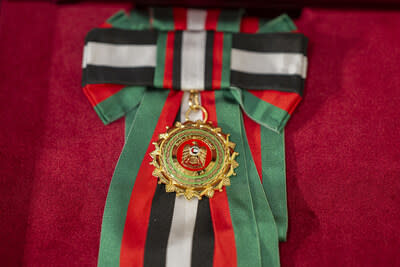 A photo of First Class Order of Zayed II medal and HH Sheikh Mohamed bin Zayed Al Nahyan, President of the United Arab Emirates (5th R), stands for a photograph with dignitaries during a COP28 international partner’s recognition ceremony