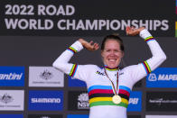Ellen van Dijk of the Netherlands reacts on the podium after winning the women's individual time trial at the world road cycling championships in Wollongong, Australia, Sunday, Sept. 18, 2022. (AP Photo/Rick Rycroft)