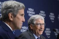 John F. Kerry, Special Presidential Envoy for Climate of the United States of America, left, and William H. Gates, Co-Chair, Bill & Melinda Gates Foundation, USA, right, attend a Press Conference on First Movers Coalition Announce Expansion, during the 51st annual meeting of the World Economic Forum, WEF, in Davos, Switzerland, on Wednesday, May 25, 2022. The forum has been postponed due to the Covid-19 outbreak and was rescheduled to early summer. The meeting brings together entrepreneurs, scientists, corporate and political leaders in Davos under the topic "History at a Turning Point: Government Policies and Business Strategies" from 22 - 26 May 2022. (Gian Ehrenzeller/Keystone via AP)