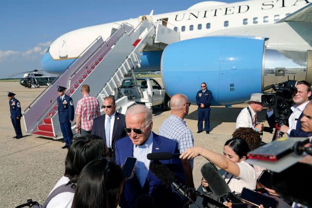 PHOTO: President Joe Biden speaks to members of the media after exiting Air Force One, July 20, 2022, at Andrews Air Force Base, Md. (Evan Vucci/AP)