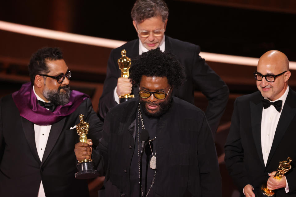 (L-R) Joseph Patel, Robert Fyvolent, Questlove, and David Dinerstein accept the Documentary (Feature) award for ‘Summer of Soul (…Or, When the Revolution Could Not Be Televised)’ onstage during the 94th Annual Academy Awards on March 27, 2022 in Hollywood, California. - Credit: Neilson Barnard/Getty Images