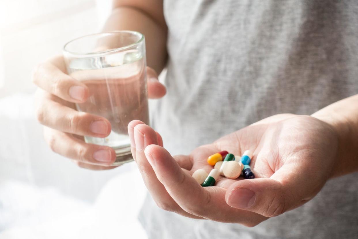 man hand holding medicine