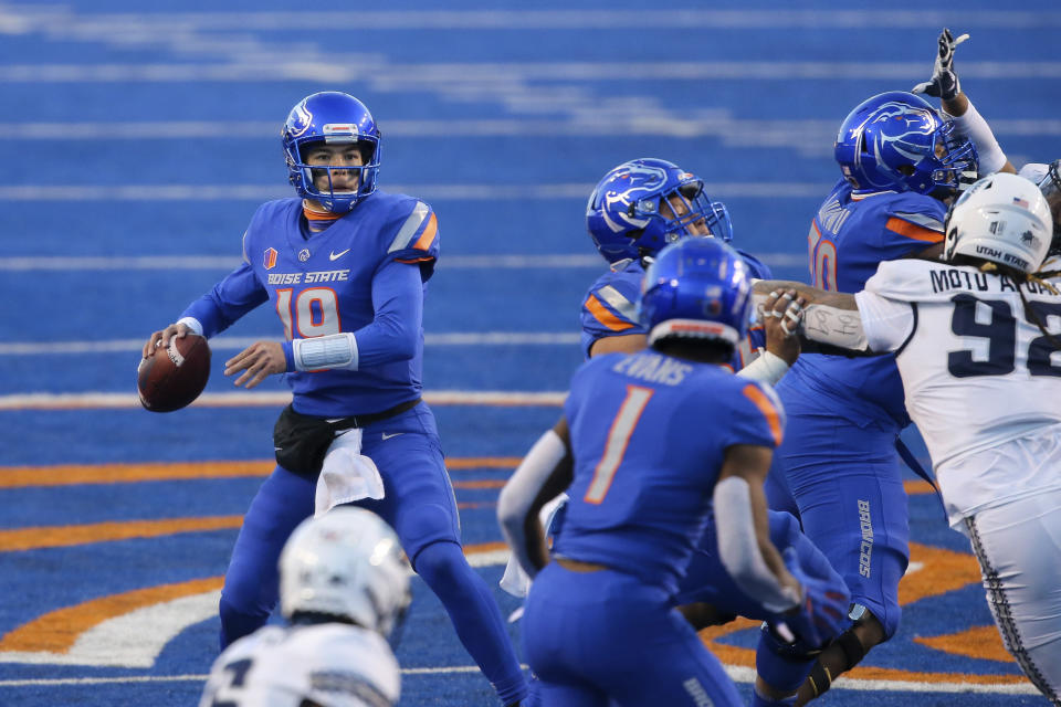 Boise State quarterback Hank Bachmeier (19) looks down field to throw the ball against Utah State during the first half of an NCAA college football game Saturday, Oct. 24, 2020, in Boise, Idaho. Boise State won 42-13. (AP Photo/Steve Conner)