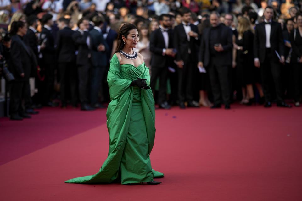 Michelle Yeoh poses for photographers upon arrival at the premiere of the film 'Firebrand' at the 76th international film festival, Cannes, southern France, Sunday, May 21, 2023. (AP Photo/Daniel Cole)