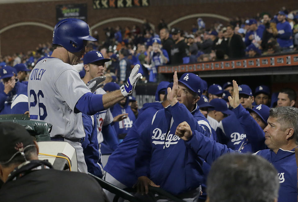 The Dodgers finally broke their 11-game losing streak and clinched a playoff spot in the process. (AP)