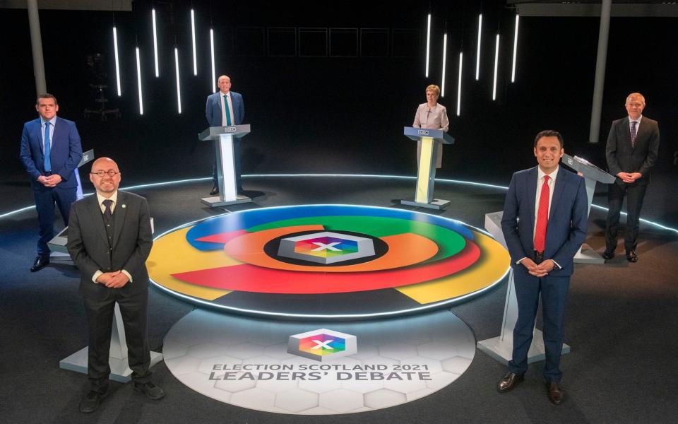 For use in UK, Ireland or Benelux countries only BBC handout photo of (clockwise from top left) presenter Glenn Campbell, Scottish National Party leader Nicola Sturgeon, Scottish Liberal Democrat leader Willie Rennie, Scottish Labour leader Anas Sarwar Scottish Greens co-leader Patrick Harvie and Scottish Conservative leader Douglas Ross, during the Election Scotland 2021: Leaders' Debate at Edinburgh's Corn Exchange. PA Photo. Picture date: Tuesday May 4, 2021. The Scottish Parliamentary elections take place on Thursday. See PA story SCOTLAND Election. Photo credit should read: Kirsty Anderson/BBC/PA Wire NOTE TO EDITORS: Not for use more than 21 days after issue. You may use this picture without charge only for the purpose of publicising or reporting on current BBC programming, personnel or other BBC output or activity within 21 days of issue. Any use after that time MUST be cleared through BBC Picture Publicity. Please credit the image to the BBC and any named photographer or independent programme maker, as described in the caption. - Kirsty Anderson/BBC/PA Wire