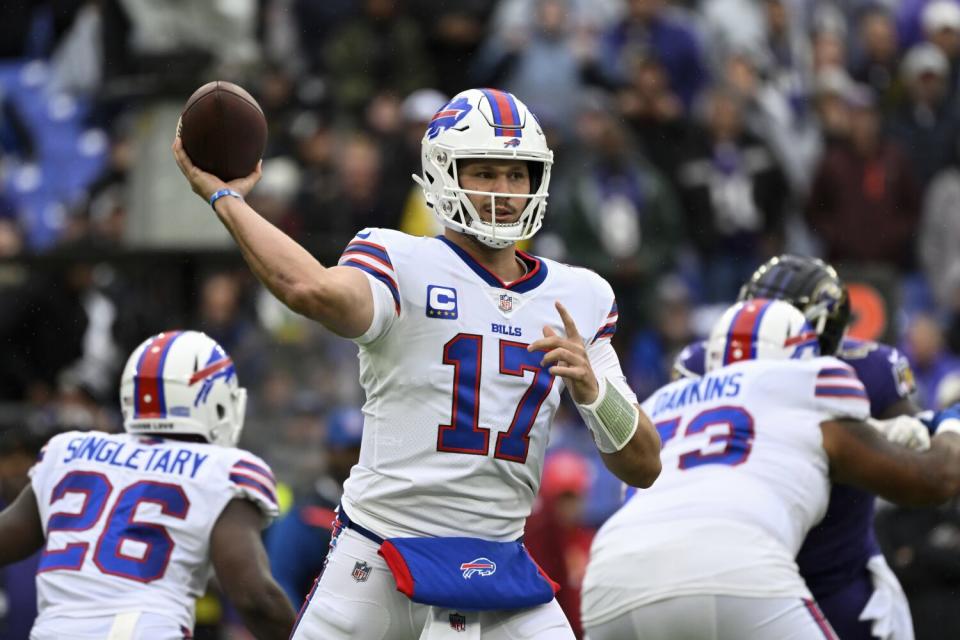 Buffalo Bills quarterback Josh Allen (17) throws against the Ravens.