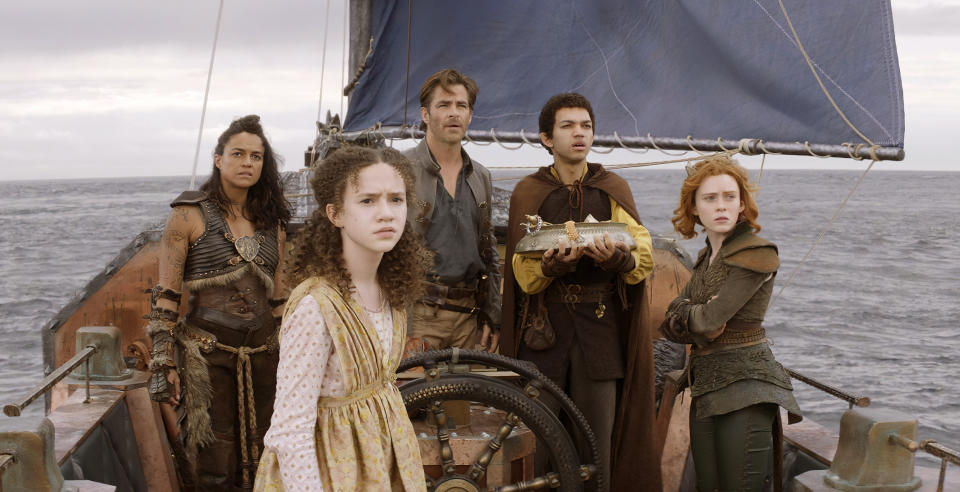 This image released by Paramount Pictures shows Chloe Coleman, foreground, Michelle Rodriguez, background from left, Chris Pine, Justice Smith and Sophia Lillis in a scene from "Dungeons & Dragons: Honor Among Thieves." (Paramount Pictures via AP)