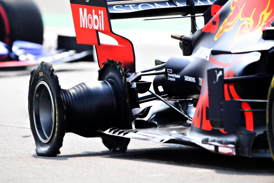 MEXICO CITY, MEXICO - OCTOBER 27: Max Verstappen of the Netherlands driving the (33) Aston Martin Red Bull Racing RB15 loses his right rear tyre to a puncture during the F1 Grand Prix of Mexico at Autodromo Hermanos Rodriguez on October 27, 2019 in Mexico City, Mexico. (Photo by Clive Mason/Getty Images)