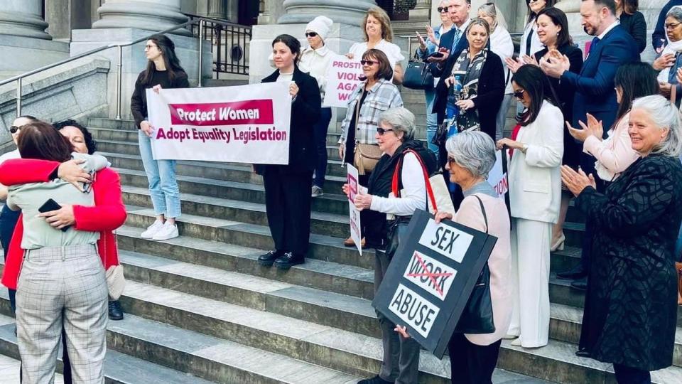 South Australian Legislative Council Liberal leader Nicola Centofanti hugs Wahine Toa Rising founder Ally-Marie Diamond on the steps of parliament house in Adelaide. Picture: Supplied