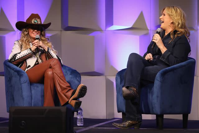 <p>Danielle Del Valle/Getty</p> Lainey Wilson and Trisha Yearwood at CRS in Nashville on Feb. 29, 2024