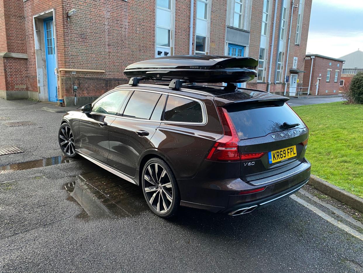 The sleek roofbox does little to diminish the Volvo's sleek looks