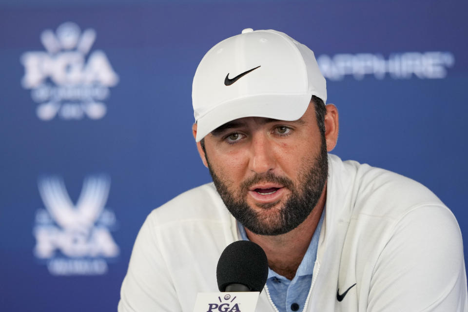 FILE - Scottie Scheffler speaks during a news conference after the second round of the PGA Championship golf tournament at the Valhalla Golf Club, Friday, May 17, 2024, in Louisville, Ky. The Kentucky police officer who arrested top-ranked golfer Scottie Scheffler outside the PGA Championship is receiving “corrective action” for failing to have his body-worn camera activated when he approached the golfer's vehicle — an interaction that police said resulted in the officer being dragged to the ground, authorities said Thursday, May 23, 2024. (AP Photo/Matt York, File)