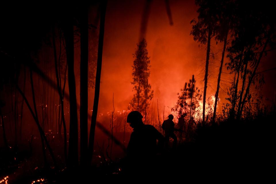 Firefighters tackle a wildfire at Amendoa in Macao, central Portugal on July 21, 2019. (Photo: Patricia De Melo Moreira/AFP/Getty Images)