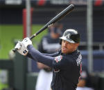 Atlanta Braves first baseman Freddie Freeman watches his hit during live batting practice before playing the Baltimore Orioles in a spring baseball game at CoolToday Park in North Port, Fla., Wednesday, March 3, 2021. (Curtis Compton/Atlanta Journal-Constitution via AP)