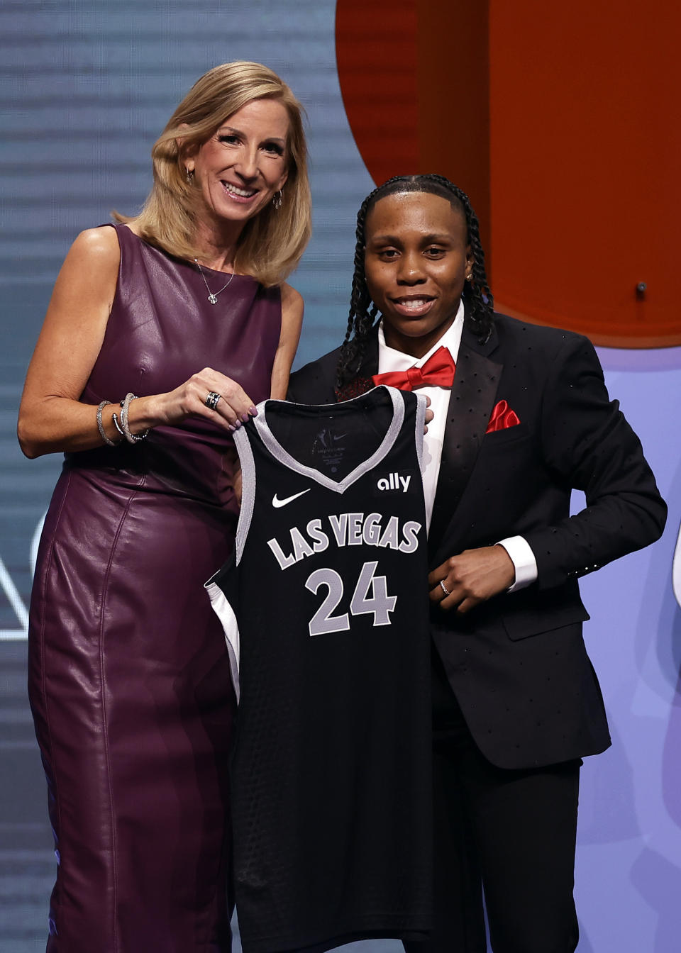 Syracuse's Dyaisha Fair, right, poses for a photo with WNBA commissioner Cathy Engelbert, left, after being selected 16th overall by the Las Vegas Aces during the second round of the WNBA basketball draft on Monday, April 15, 2024, in New York. (AP Photo/Adam Hunger)