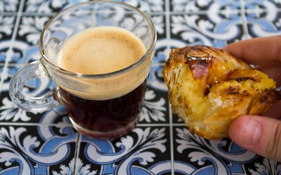 pastel de nata and espresso coffee - Getty