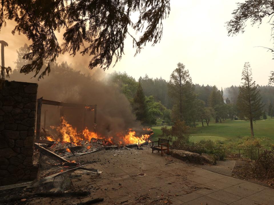 The main building and restaurant at Meadowood Napa Valley luxury resort burns after the Glass Incident Fire moved through the area on September 28, 2020 in St. Helena, California. The fast-moving Glass Incident, originally called the Glass Fire, has burned over 11,000 acres in Sonoma and Napa counties. The fire is zero percent contained. Much of Northern California is under a red flag warning for high fire danger through Monday evening.