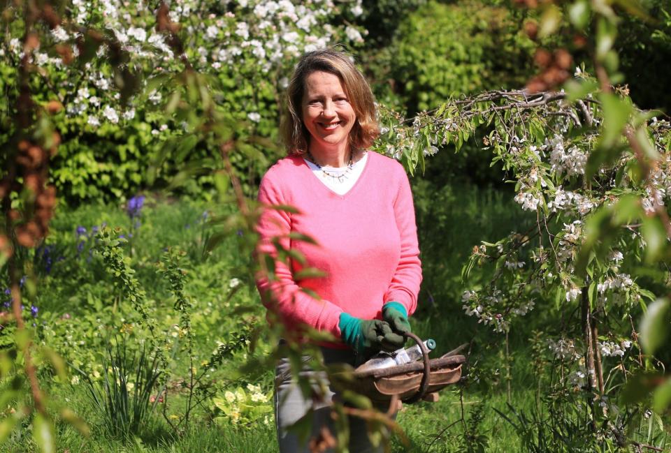 Christie says nurturing and documenting the plants and wildlife in her garden has brought her closer to her late father - Clara Molden