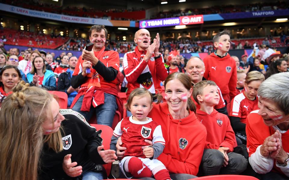 Austria fans show their support prior to the UEFA Women's EURO 2022 group A match between England and Austria at Old Trafford on July 06, 2022 in Manchester, England. - Laurence Griffiths/Getty Images Europe