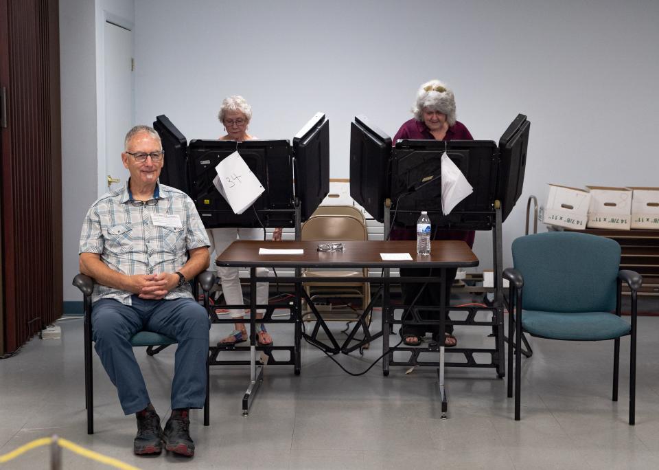 Voters cast their ballots during early voting in Columbia, TN. 