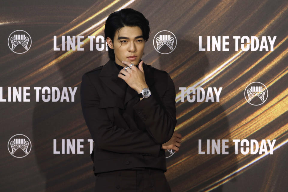 Taiwanese singer Edward Chen arrives for the 32nd Golden Melody Awards in Taipei, Taiwan, Saturday, Aug. 21, 2021. Golden Melody Awards, one of the world's biggest Chinese-language pop music annual events and postponed from June to Aug. due to the coronavirus pandemic. (AP Photo/Chiang Ying-ying)