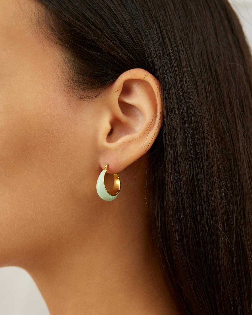 <p>shop-daphine.com</p><p><strong>£80.00</strong></p><p><a href="https://shop-daphine.com/collections/all/products/enamel-earrings" rel="nofollow noopener" target="_blank" data-ylk="slk:Shop Now;elm:context_link;itc:0;sec:content-canvas" class="link ">Shop Now</a></p><p>Raise your hand if you believe minimalist jewelry should include color—Daphine is all about that. Sure, the brand stocks all the classics, but you'll also find fresh pieces like this soft pastel earring pictured here. Founded by a pair of besties in London, <a href="https://shop-daphine.com/pages/our-story" rel="nofollow noopener" target="_blank" data-ylk="slk:Daphine;elm:context_link;itc:0;sec:content-canvas" class="link ">Daphine</a> is dedicated to keep the bond of "a shared perfectionism, a love of simple, uncomplicated design," and celebration of strong women alive.<br></p>