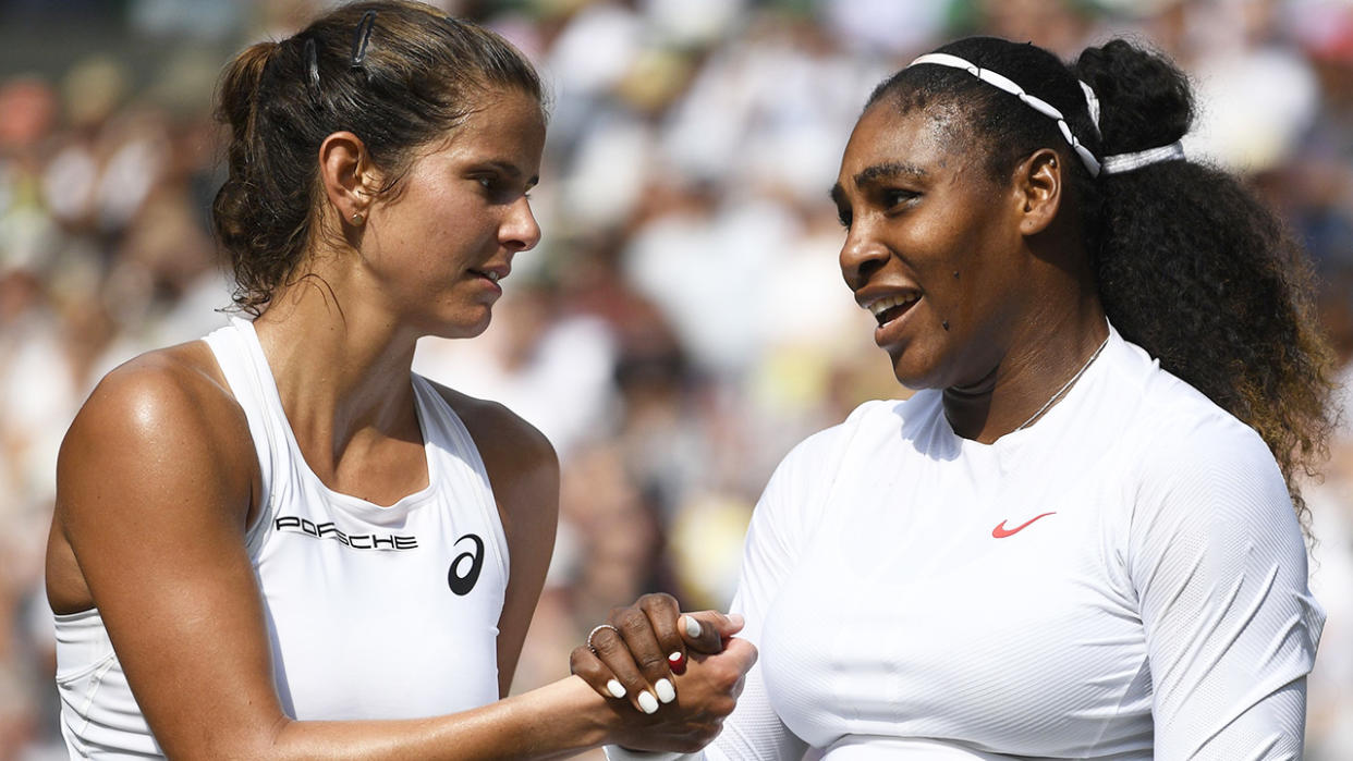 German tennis player Julia Goerges is pictured shaking hands with Serena Williams after their match at Wimbledon in 2018.