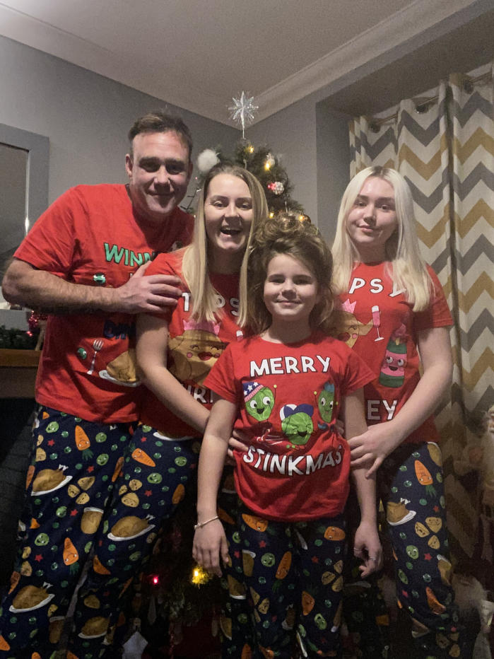 The family found solace in the twinkly tree-lights which brightened up their evenings and gave hope, pictured with her partner Shayne and children, Demi, and Kayleigh, right.  (SWNS)
