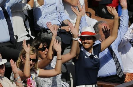 (L-R) Former tennis great Chris Evert, Paris Mayor Anne Hidalgo, French Women Rights, Youth and Sports Minister Najat Vallaud-Belkacem and French Tennis Federation (FFT) President Jean Gachassin watch the women's singles final match between Maria Sharapova of Russia and Simona Halep of Romania at the French Open tennis tournament at the Roland Garros stadium in Paris June 7, 2014. REUTERS/Jean-Paul Pelissier