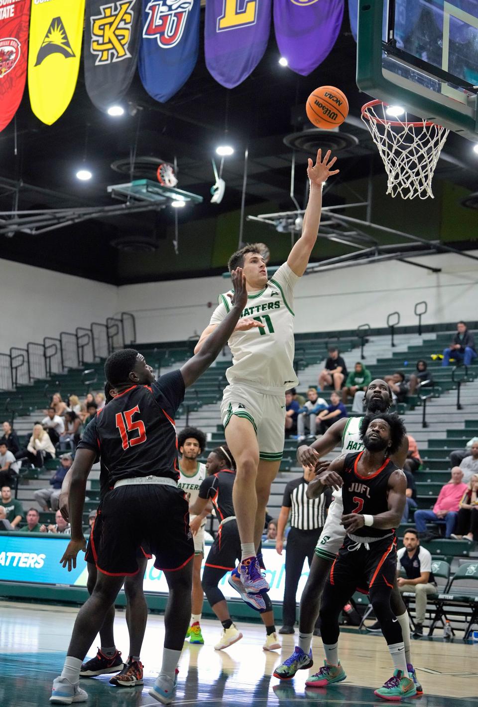 Stetson's Josh Smith (11) shoots to the basket during a game with Johnson University at Edmunds Center in DeLand, Tuesday, Nov. 29, 2022.