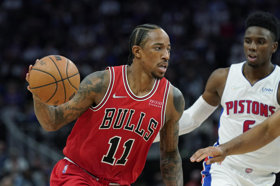 Chicago Bulls forward DeMar DeRozan (11) drives as Detroit Pistons guard Hamidou Diallo (6) defends during the second half of an NBA basketball game, Wednesday, Oct. 20, 2021, in Detroit. (AP Photo/Carlos Osorio)