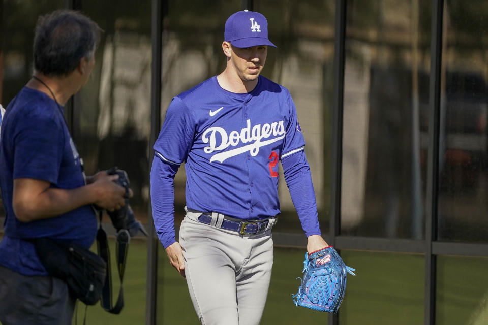 Los Angeles pitcher Walker Buehler participates in spring training baseball workouts at Camelback Ranch in Phoenix, Thursday, March. 7, 2024. (AP Photo/Darryl Webb)