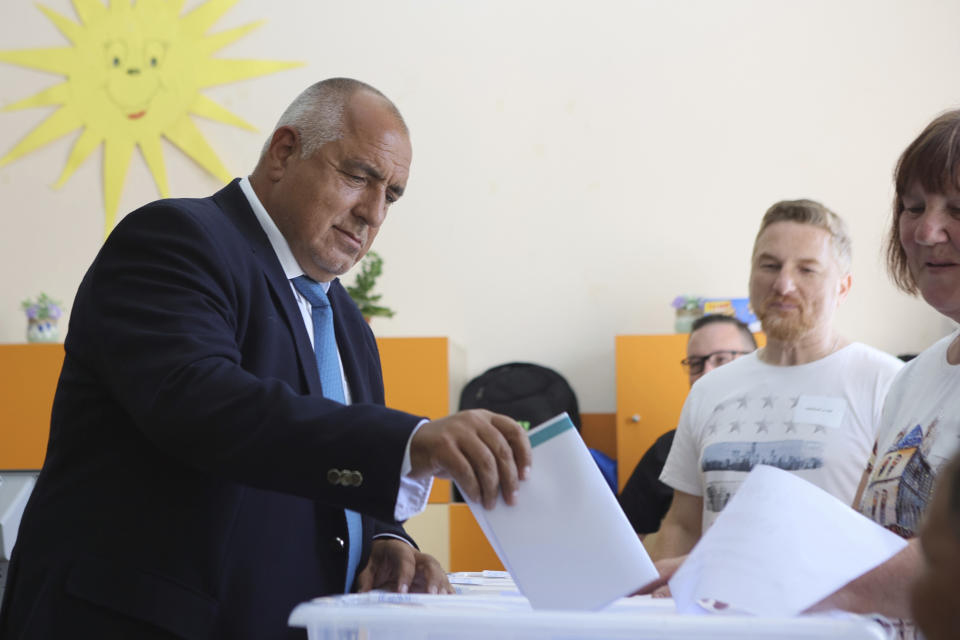 Bulgarian former Prime Minister Boyko Borissov casts his vote at a polling station in Bankya, Sunday, June 9, 2024. Voters in Bulgaria are going to the polls on Sunday in national and European Parliament elections that have been overshadowed by political instability, economic inequality and growing concern over the war in nearby Ukraine. (AP Photo/Valentina Petrova)