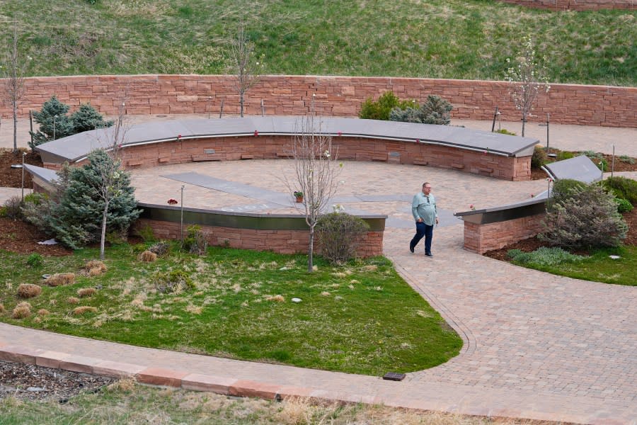 A visitor moves through the Columbine Memorial