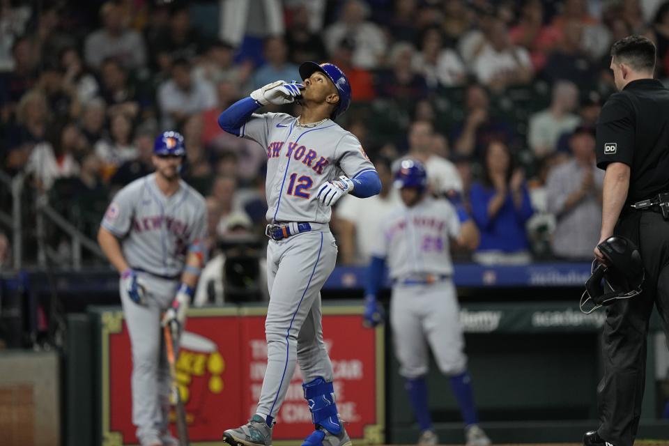 New York Mets' Francisco Lindor (12) celebrates after hitting a three-run home run against the Houston Astros during the third inning of a baseball game Monday, June 19, 2023, in Houston. (AP Photo/David J. Phillip)