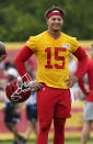 Kansas City Chiefs quarterback Patrick Mahomes watches teammates during drills at the team's NFL football training camp Saturday, July 31, 2021, in St. Joseph, Mo. (AP Photo/Ed Zurga)